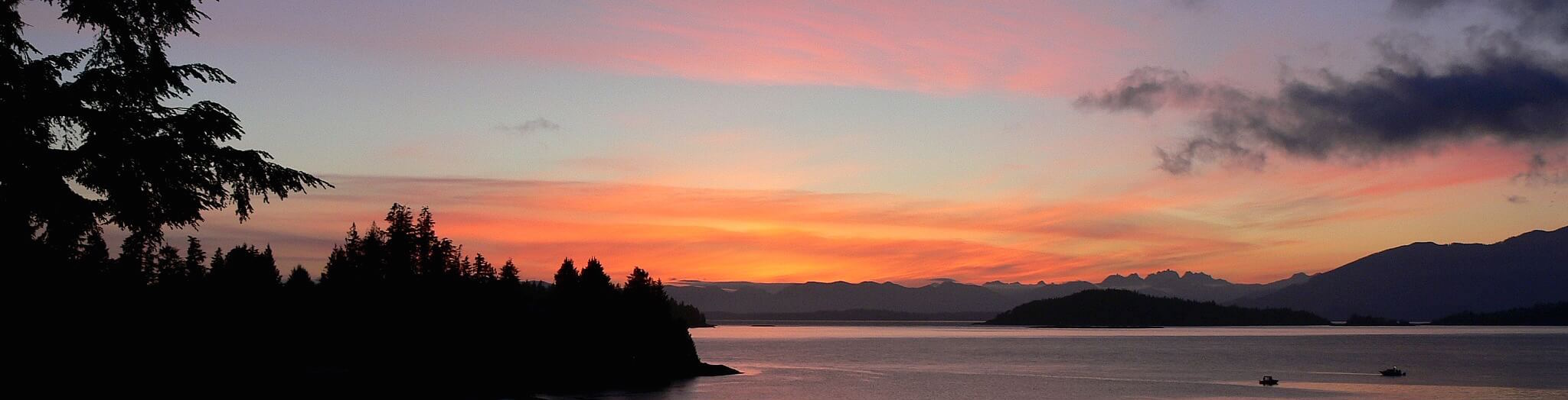 Beautiful Bamfield Sunset with pink sky over water